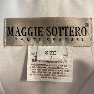 I am selling a white pristine wedding dress size 2 from the brand Maggie Sottero
